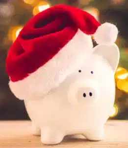 Piggy bank with Santa hat on