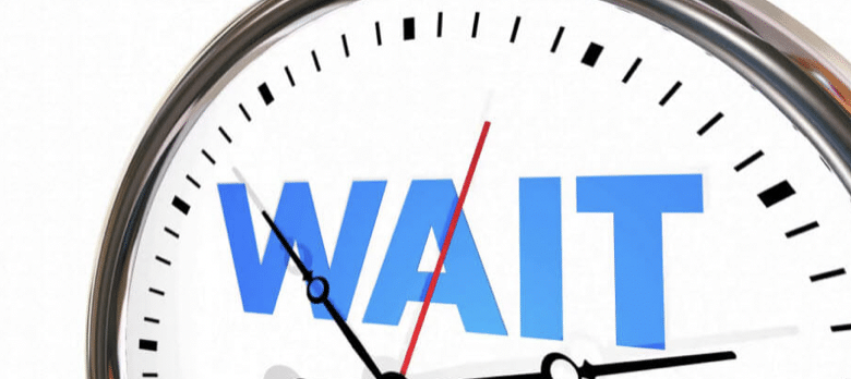 Clock ticking saying 'wait'