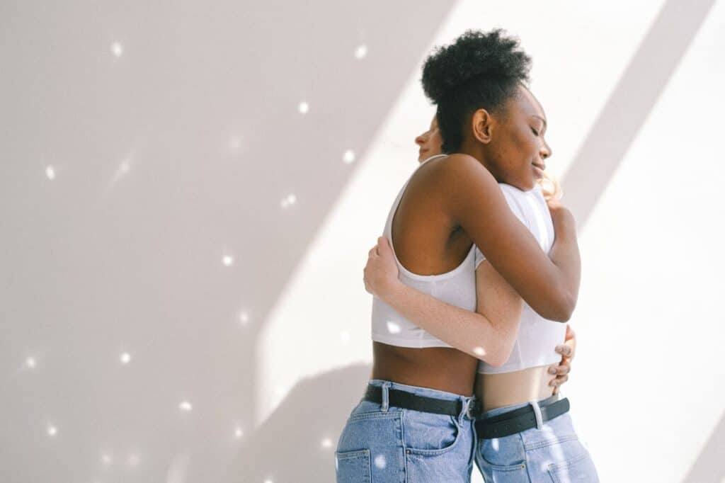 Two women embracing